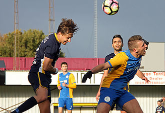 Een bitsig kopduel tussen Stan Croonen en Arno Claes. (© foto Jeroen Goolaerts)